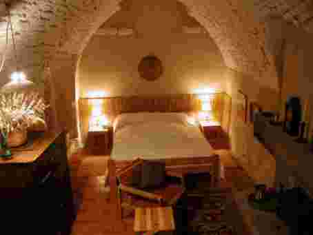 Downstairs bedroom and fireplace - click for larger picture